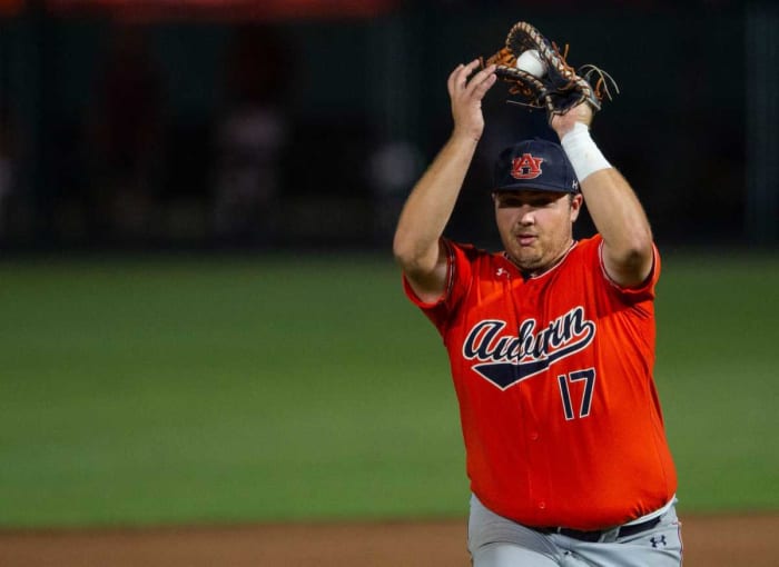 Auburn Tigers infielder Sonny DiChiara (17) catches a fly ball during the NCAA regional baseball tournament at Plainsman Park in Auburn, Ala., on Saturday, June 4, 2022. Auburn Tigers defeated Florida State Seminoles 21-7.